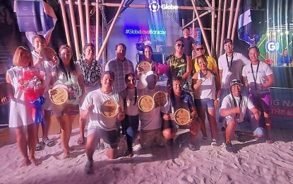 <p><strong>BEACH TENNIS</strong>. Winners and runners-up of the Beach Tennis Love Boracay pose after the awarding ceremony on April 30, 2023. The two-day tournament, organized by the Boracay Racquet Sports Club PH, was held in front of the White House Resort. <em>(Contributed photo)</em></p>