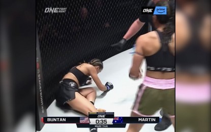<p>DOWN. Jackie Buntan (right) shuts down Diandra Martin (left) during their match at ONE on Prime Video 10 in Broomfield, Colorado on Saturday (Manila time, May 6, 2023). The Fil-Am fighter connected on a right hook that sent the Australian down the floor.  <em>(Photo screengrab from ONE Championship Facebook page)</em></p>