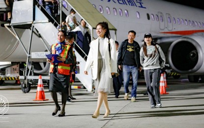 <p><strong>WELCOME TO PH.</strong> Chinese tourists alight from the plane upon arrival in Kalibo, Aklan on April 18, 2023. It is the first chartered flight from China since the market reopened for international travel on Jan. 8. <em>(Photo courtesy of DOT)</em></p>