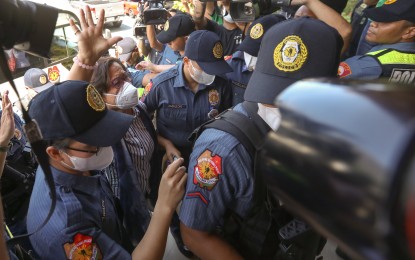 <p><strong>HOPEFUL.</strong> Former senator Leila de Lima (right hand raised) attends the resumption of the hearing on one of her two remaining drug cases at the Muntinlupa Regional Trial Court on May 8, 2023. The case of conspiracy to commit illegal drug trading was dismissed but her bail application for the final case was rejected on June 7. <em>(PNA photo by Yancy Lim)</em></p>