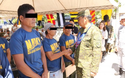 <p><strong>REPATRIATED.</strong> Lt. Gen. Greg Almerol, commander of the Eastern Mindanao Command, welcomes on Monday (May 8, 2023) the six Filipino fisherfolk who were sent home from Indonesia. Three of the repatriates are from Sultan Kudarat province and the others from General Santos City. <em>(Photo courtesy of Eastmincom)</em></p>