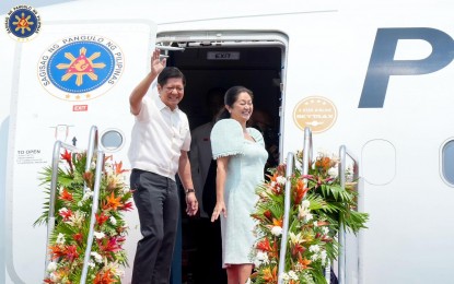 <p><strong>ASEAN SUMMIT BOUND.</strong> President Ferdinand R. Marcos Jr. and First Lady Liza Araneta-Marcos wave to the crowd before leaving for Labuan Bajo, Indonesia on Tuesday (May 9, 2023) to attend the 42nd ASEAN Summit and Related Summits. Marcos is optimistic that ASEAN will overcome challenges that are unique in the region. <em>(PNA photo by Rey Baniquet)</em></p>