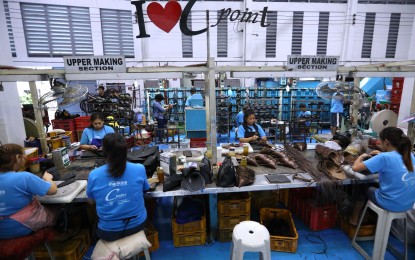 <p><strong>WAGE HIKE DILEMMA</strong>. The formal labor sector includes these shoe factory employees in Marikina City, pictured here on May 11, 2023. The Employers Confederation of the Philippines (ECOP) said the proposed PHP150 legislated daily pay increase will only widen the wage gap between the formal and informal sectors. <em>(PNA photo by Joey O. Razon)</em></p>