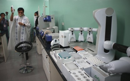 <p><strong>RESEARCH EQUIPMENT.</strong> A priest blesses the equipment to be used for the ReDMatCh (Research and Development Center for Maternal and Child Health) located in Davao Medical School Foundation Inc. on Thursday (May 11, 2023). The machine will help determine and compare mother and child metabolomic and microbiome profiles which will be used in the study on childhood stunting, pediatric dengue, and postpartum depression. <em>(PNA photo by Robinson Niñal Jr.)</em></p>