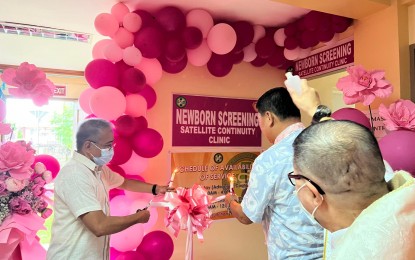<p><strong>CONTINUITY CARE</strong>. Dr. Ferchito Avelino, DOH-Bicol assistant regional director (left) and Catanduanes Governor Joseph Cua (center) lead the opening of the Newborn Screening (NBS) Satellite Continuity Clinic at the Eastern Bicol Medical Center (EBMC) in Virac, Catanduanes. The EBMC is the first local government unit-run hospital in Bicol to have an NBS continuity clinic. <em>(Photo courtesy of DOH-Bicol)</em></p>