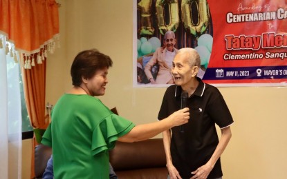 Ex-Surigao Sur village chief turns 100, gets P100K cash gift