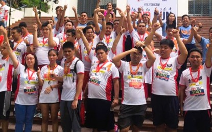 <p><strong>FOR A CAUSE.</strong> Finishers of the inaugural "PWD Fun Run: PWeDe Pala, Heto Kami, Join Kayo!" pose with their medals at the University of the Philippines Academic Oval in Diliman, Quezon City on May 26, 2019 before the Covid-19 pandemic temporarily halted the event. The second edition will be held on May 28, 2023 at the same venue. <em>(Contributed photo)</em></p>
