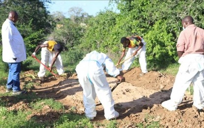 <p><strong>CULT DEATH.</strong> Officials inspect a forested area where bodies were found near the Good News International Church in Malindi town of Kilifi, Kenya on May 11, 2023. The death toll in the cult case is now at 179. <em>(Anadolu)</em></p>