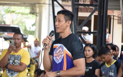 <p><strong>LEGEND</strong>. Former pro basketball player Danny Ildefonso speaks at a basketball league in his home province of Pangasinan in this undated photo. Ildefonso's foundation is currently recruiting young Pangasinenses who will be trained to become future basketball superstars. <em>(Photo courtesy of Danny Ildefonso Facebook)</em></p>