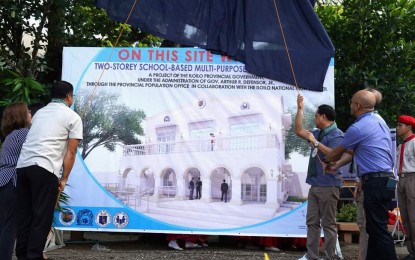 <p><strong>TEEN CENTER</strong>. Iloilo Governor Arthur Defensor Jr. (third from left) unveils the design of the teen center that will be constructed at the Iloilo National High School during the groundbreaking ceremony on Monday (May 15, 2023). The provincial government has PHP35-million funds allotted for the construction of teen centers in various national high schools in the province this year. <em>(PNA photo courtesy of Balita Halin sa Kapitolyo)</em></p>