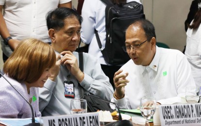 <p><strong>WIN-WIN SOLUTION</strong>. National Treasurer Rosalia de Leon (left) discusses with Department of National Defense Undersecretary Ignacio Madriaga (center) and Officer-in-Charge Senior Undersecretary Carlito Galvez Jr. during a Senate hearing on Monday (May 15, 2023). The Committee on National Defense and Security, Peace, Unification and Reconciliation discussed proposals to amend the pension system of military and uniformed personnel. <em>(PNA photo by Avito Dalan) </em></p>