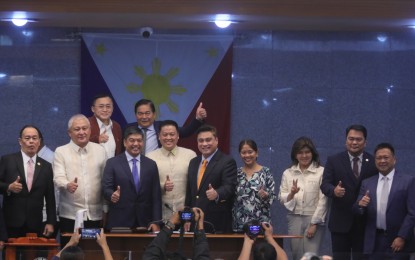 <p><strong>FULL SUPPORT.</strong> Department of Social Welfare and Development Secretary Rex Gatchalian (front row, 4th from left) poses with senators and other members of the Commission on Appointments after his confirmation hearing at the Senate on Tuesday (May 16, 2023). Gatchalian vowed to focus on his agency's mandate to end the cycle of poverty by strengthening the agency’s livelihood programs and implementing nutrition-specific programs. <em>(PNA photo by Avito C. Dalan)</em></p>