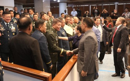 <p><strong>NEW AFP OFFICIALS.</strong> Senators greet the newly promoted officers of the Armed Forces of the Philippines. The Commission on Appointments confirmed the ad interim appointments of 49 generals and colonels on Wednesday (May 17, 2023). <em>(PNA photo by Avito Dalan)</em></p>