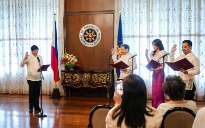 <p>OATH-TAKING. President Ferdinand R. Marcos Jr. administers the oath-taking of Jonathan Tan as Administrator and Chairman of the Subic Bay Metropolitan Authority (SBMA) Board of Directors, Dr. Amable Aguiluz V as Special Envoy of the President to Japan for Trade and Investments and Marge Gutierrez as Undersecretary of the Department of the Interior and Local Government (DILG) in a ceremony at the President’s Hall in Malacañang on Wednesday (May 17, 2023). <em>(Photo from PCO FB page)</em></p>