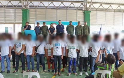 <p><strong>EX-REBELS.</strong> The Peace 911, Davao City's peace and order initiative, turns over 44 former members of the New People’s Army (NPA) in Paquibato district, Davao City to the local security sector during the program's 5th anniversary in Barangay Paquibato Proper on May 16, 2023. The security sector, composed of the Davao City Police Office and the Philippine Army’s 10th Infantry Division, received the former rebels. <em>(Photo courtesy of 10ID)</em></p>