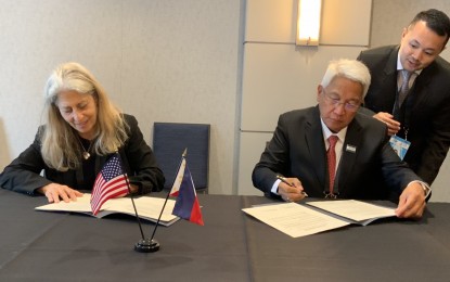 <p><strong>MOU SIGNING.</strong> Transportation Undersecretary Elmer Francisco Sarmiento (right, seated) and US Department of Transportation Assistant Secretary for Aviation and International Affairs Annie Petsonk sign a memorandum of agreement on May 16, 2023 in Detroit, Michigan in the US. With the signing of the ROD, the Civil Aeronautics Board, an attached agency of the DOTr, will work closely with the US Department of Transportation to promote greater cooperation and discuss issues of mutual interest and concern related to aviation policy and regulation. <em>(DOTr photo)</em></p>