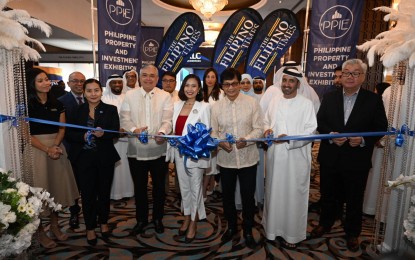 <p><strong>HIGH-LEVEL DELEGATION</strong>. Interior Secretary Benhur Abalos (3rd from right) opens the 9th Philippine Property and Investment Exhibition and the inaugural Philippines Economic & Investment Summit at the  Radisson Blu Hotel, Deira Creek, Dubai on May 12, 2023. With Abalos are Philippine Ambassador to the UAE Alfonso Ferdinand Ver (3rd from left), Emirates Travellers Festival chair Awad Mohammed Sheikh Al Murjin (2nd from right), and Dr. Karen Remo (4th from left), CEO and founder of New Perspective Media Group and chair of PPIE and PIES. <em>(Photo from New Perspective Media Group)</em></p>