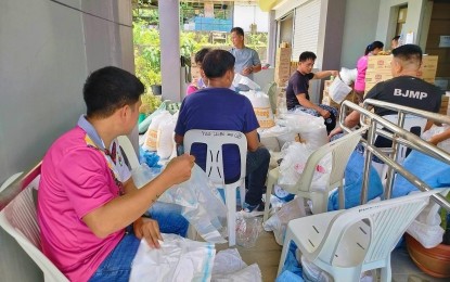 <p><strong>SUPER TYPHOON</strong>. Government workers of Apayao province ready food stocks on Tuesday (May 25, 2023) in preparation for the incoming Super Typhoon Mawar. Local residents were urged to heed precautions and evacuation orders if necessary. <em>(Photo courtesy of Provincial Government of Apayao)</em></p>