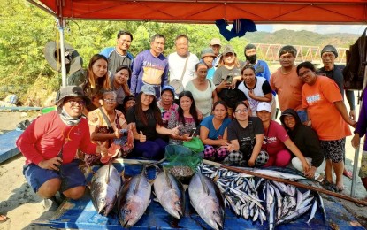 <p><strong>FOOD SECURITY</strong>. Pasuquin fisherfolk in Ilocos Norte show their catch in this undated photo. Recently, the BFAR launched a lambaklad project for the Dilavo Fishermen Association to boost their production. <em>(Contributed Photo)</em></p>