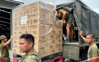 <p><strong>FAMILY FOOD PACKS.</strong> Soldiers load boxes of family food packs (FPP) to a military truck, in this undated photo. DSWD-7 regional director Shalaine Marie Lucero on Wednesday (May 24, 2023) said 45,000 FPPs are being readied in case Typhoon Betty (Mawar) hits localities in the Visayas. <em>(Photo courtesy of OPAV)</em></p>