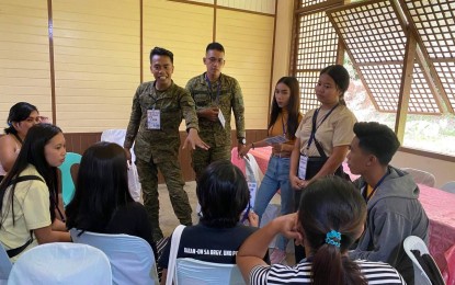 <p><strong>NO TO NPA RECRUITMENT.</strong> Soldiers facilitating the youth summit in Catubig, Northern Samar in this May 21, 2023 photo. The Philippine Army held the first youth summit in Catubig, Northern Samar in a bid to stop the recruitment of the New People’s Army among teens in the province. <em>(Photo courtesy of Philippine Army)</em></p>