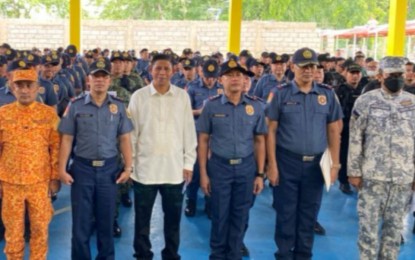 <p><strong>SEND-OFF</strong>. Officials of the Bacolod City Police Office, Bureau of Fire Protection, and Philippine Coast Guard lead the send-off ceremony of the security forces for the Bacolod Chicken Inasal Festival at the BCPO gymnasium on Thursday (May 25, 2023). The three-day festival will kick off at the North Capitol Road on Friday afternoon (May 26).<em> (Photo courtesy of Bacolod City Police Office)</em></p>