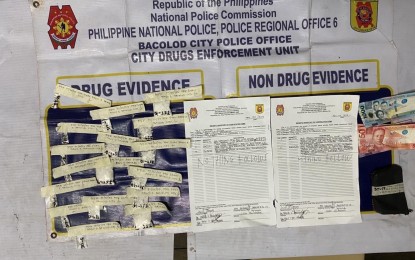 <p><strong>DRUG HAUL</strong>. Operatives of the Bacolod City Police Office-City Drug Enforcement Unit seize 106 grams of shabu valued at PHP720,800 during a buy-bust in Purok Sigay, Barangay 2 on Wednesday afternoon (May 24, 2023). The arrested suspect, Jeo Tongoy, 21, has been tagged as a high-value individual. <em>(Photo courtesy of Bacolod City Police Office)</em></p>