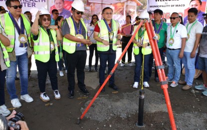 <p><strong>HEALTH CENTER.</strong> Senator Christopher Lawrence Go (4th from L) leads the embedding of the capsule during the groundbreaking ceremony of the fifth Super Health Center in Barangay Binuangan, Maco Davao de Oro, on Thursday (May 25, 2023). The PHP11.5 million worth of health facility will provide all the basic health needs of constituents in the province.  <em>(PNA photo by Robinson Niñal Jr.)</em></p>