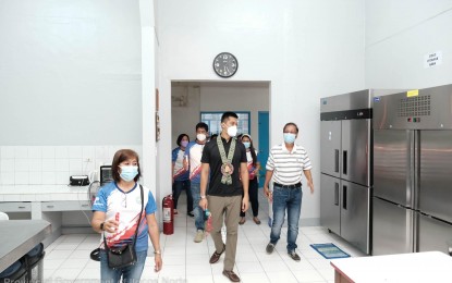 <p><strong>NEW OUTPATIENT DEPARTMENT.</strong> Ilocos Norte Gov. Matthew Joseph Manotoc (middle) and Dr. Rogelio Balbag (right), executive director of the Ilocos Norte Hospital and Management Council, check on the new facilities of the Gov. Roque B. Ablan Sr. Memorial Hospital in this undated photo. A new expanded OPD was inaugurated last Wednesday (May 24, 2023) to cater to more patients. <em>(Photo by the Provincial Government of Ilocos Norte)</em></p>