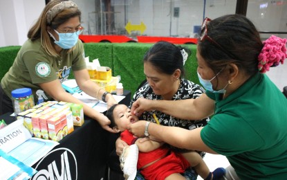 <p><strong>PROTECTION.</strong> A toddler gets vaccinated against vaccine-preventable diseases in this undated photo. More than eight million children have received vaccines for measles and rubella a week before the Department of Health’s campaign against vaccine-preventable diseases ends in the second week of June 2023. <em>(File photo)</em></p>