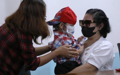 <p><strong>SAFE WITH MOM.</strong> A 20-month-old boy, whom an orphanage in Quezon City allegedly refused to release to his biological mother, was finally reunited with the latter on Friday (May 26, 2023) after four months of separation. DSWD spokesperson Assistant Secretary Romel Lopez said the boy was among the more than 140 children taken into custody by the DSWD from Gentle Hands Incorporated after it issued a cease-and-desist order based on a complaint that the private orphanage has violated Republic Act 7610 or the Anti-Child Abuse Act. <em>(PNA photo by Joey Razon)</em></p>