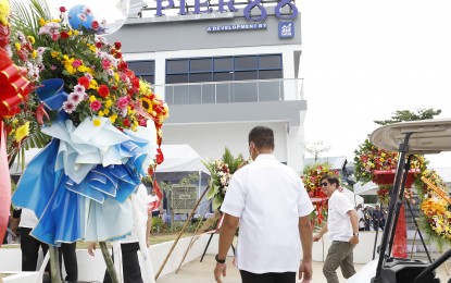 <div class="caption">
<p><strong>FASTER WAY.</strong> President Ferdinand R. Marcos Jr. (right) arrives for the launch of <span class="x193iq5w xeuugli x13faqbe x1vvkbs x1xmvt09 x1lliihq x1s928wv xhkezso x1gmr53x x1cpjm7i x1fgarty x1943h6x xudqn12 x3x7a5m x6prxxf xvq8zen xo1l8bm xzsf02u x1yc453h" dir="auto">Pier 88, Cebu province’s first smart port located in the Municipality of Liloan, on Saturday (May 27, 2023). The three-hectare private-run port will serve as a marine highway and provide a faster alternative route for daily commuters from the northern part of Metro Cebu going to Mandaue, Lapu-Lapu and Cebu cities, and vice versa. </span><em>(PNA photo by Alfred Frias)</em></p>
</div>