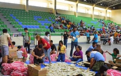 <p><strong>ONE STEP AHEAD.</strong> Employees of Lal-lo, Cagayan provincial government pack relief goods on Saturday (May 27, 2023) for distribution to residents who may be affected by Super Typhoon Betty. As of the 5 p.m. weather bulletin, the province is under Signal No. 1, including Babuyan Islands. <em>(Photo courtesy of Lal-Lo LGU).</em></p>