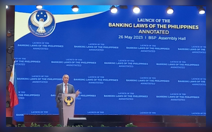 <p><strong>BANKING LAWS.</strong> Bangko Sentral ng Pilipinas (BSP) Governor Felipe Medalla addresses bank owners during the launch of the book "Banking Laws of the Philippines – Annotated" at the Central Bank’s main office in Manila Friday night (May 26, 2023). Medalla said bank owners are like public servants – they are responsible for protecting the public's funds. <em>(PNA photo by Joann Santiago-Villanueva)</em></p>