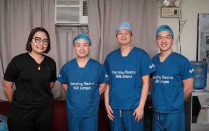 <p><strong>EXCHANGED DOCTORS.</strong> Dr. Marjorie Sierra (left), OIC of the Orthopedic Department of the Mariano Marcos Memorial Hospital and Medical Center, and some of the visiting surgeons from the Singapore General Hospital. At least six patients got knee replacements during their two-day surgical mission in Ilocos Norte, which began Friday (May 26, 2023). (<em>Contributed photo)</em></p>