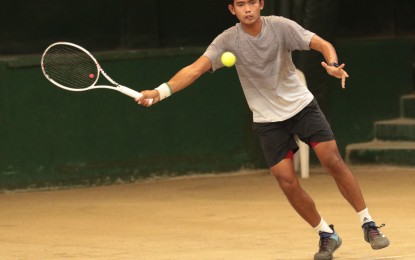 <p><strong>CHAMPION.</strong> Arthur Craig Pantino returns a forehand to John Bryan Otico during the men's singles final of the first Metro Manila Open tennis tournament at the Philippine Columbian Association indoor shell court in Paco, Manila on May 28, 2023. Pantino won, 5-7, 6-3, 2-6, 6-4, 7-5.<em> (Contributed photo)</em></p>