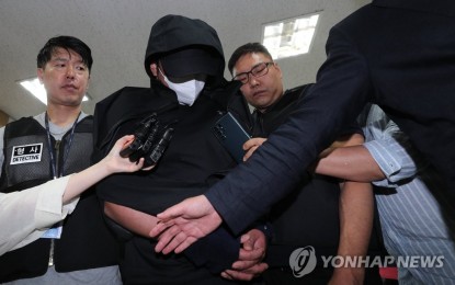 <p><strong>FLIGHT HAZARD.</strong> The man surnamed Lee who opened mid-air an emergency exit door of Asiana Airlines appears at the Daegu District Court, North Gyeongsang province, South Korea on Sunday (May 28, 2023). The plane carrying 194 passengers landed safely at Daegu International Airport but some panicked passengers showed symptoms of breathing difficulties and were taken to a hospital. <em>(Yonhap)</em></p>