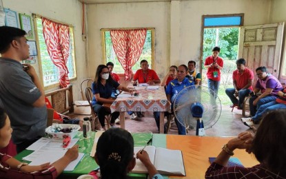 <p><strong>COCO PROCESSING HUB.</strong> Officials of the Department of Agrarian Reform (DAR) in North Cotabato meet with officers and members of Bagong Pag-asa Credit Cooperative (BPCC), a DAR-assisted organization engaged in virgin coconut oil production in Barangay New Panay, Pigcawayan, on Saturday (May 27, 2023). The DAR and PCA are eyeing a central hub for coconut processing in the province in partnership with BPCC. <em>(Photo courtesy of DAR-North Cotabato)</em></p>