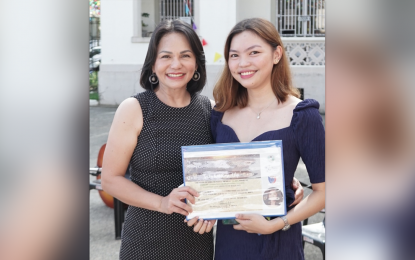 <p><strong>PRIDE OF AGUSAN.</strong> Agusan del Norte Governor Maria Angelica Rosedell Amante (left) leads the awarding of recognition to Sitty Ken Rose Alip on Monday (May 29, 2023) at the provincial capitol in Butuan City. Alip, a resident of Buenavista town, topped the March 2023 licensure examination for teachers in the elementary level with a score of 92.2 percent.<em> (Photo courtesy of Agusan del Norte PIO)</em></p>