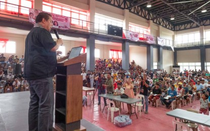 <p><strong>LONG-TERM SOLUTION</strong>. House of Representatives Speaker Ferdinand Martin G. Romualdez tells farmers and farm workers affected by the closure of the biggest sugar mill in Batangas not to lose hope, as he led the distribution of PHP10,000 cash aid each to 800 farmers in Balayan, Batangas on Tuesday (May 30, 2023). He promised to help find a long-term solution to their plight. <em>(Photo courtesy of the Office of the Speaker)</em></p>