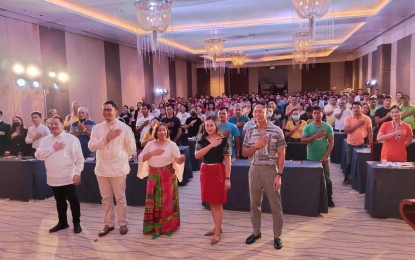 <p><strong>MABUHAY</strong>. Tourism officials and workers show the Mabuhay gesture during the Filipino Brand of Service Excellence (FBSE) regional launch at Summit Hotel in Tacloban City on Tuesday (May 30, 2023). At least 6,250 tourism service providers in Eastern Visayas will be trained on FBSE this year. <em>(PNA photo by Sarwell Meniano)</em></p>