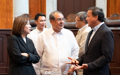 <p><strong>OPEN JUSTICE</strong>. Budget Secretary Amenah Pangandaman (left) and Supreme Court (SC) Chief Justice Alexander Gesmundo (center) meet at the SC office in Manila on Wednesday (May 31, 2023). They discussed efforts to pursue an "open justice" policy. <em>(Photo courtesy of DBM)</em></p>