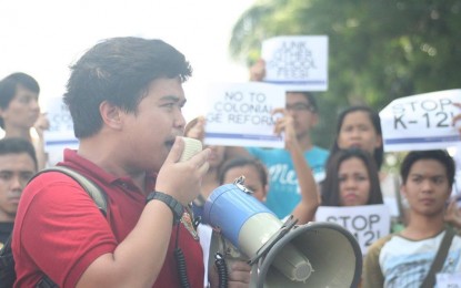 <p><strong>ACTIVISM.</strong> Joshua Sagdullas joining an anti-government rally in Tacloban as a student activist in this Aug. 11, 2017 photo. The Philippine Army confirmed on Wednesday the death of the campus activist-turned-rebel during a recent clash between government forces and the New People’s Army in Northern Samar. <em>(Photo from FB page of Joshua Musico Sagdullas)</em></p>