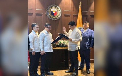 <p><strong>NEWEST MEMBER.</strong> Former Social Welfare and Development Secretary Erwin Tulfo takes his oath of office before House Majority Floor Leader Manuel Jose M. Dalipe at the House of Representatives on May 30, 2023. Tulfo is the newest member of the lower chamber, representing the Anti-Crime and Terrorism Community Development Support (ACT-CIS) party-list. <em>(Contributed photo)</em></p>