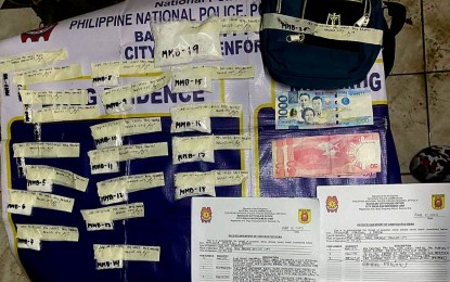 <p><strong>DRUG HAUL.</strong> Operatives of Bacolod City Police Office-City Drug Enforcement Unit seize 262 grams of shabu valued at PHP1.78 million during a buy-bust in Purok Langis, Barangay Banago on Thursday (June 1, 2023). Suspect Malcomb Baron Marshall, 24, was arrested after selling a sachet of shabu to an undercover policeman. <em>(Photo courtesy of Bacolod City Police Office)</em></p>