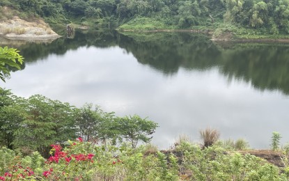 <p><strong>MINI DAM</strong>. This is a man-made lake in Barangay Nangguyudan, Batac, Ilocos Norte. The local government unit of Batac established this as a water catchment basin to irrigate farmlands during the dry season. <em>(Photo by Leilanie G. Adriano)</em></p>
