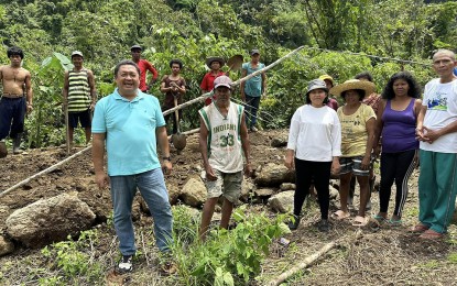<p><strong>ENGAGING THE IP COMMUNITY.</strong> Some 60 families in the conflict-affected Indigenous People community in Barangay Mahaba, Cabadbaran City, are now engaged in highland vegetable farming with the support of the local government and the Technical Education and Skills Development Authority (TESDA). Photo shows TESDA Agusan del Norte Director Rey Cueva (left, front) and Cabadbaran agriculturist Maria Arceli Soria (3rd left, front) during their ocular inspection at Sitio Sumohay of the village on May 30, 2023. <em>(Photo courtesy of TESDA-ADN Director Rey Cueva)</em></p>