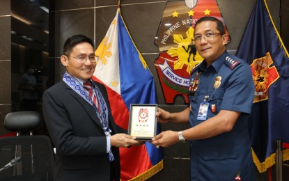 <p>AMLC executive director Mathew David (left) and PNP chief Gen. Benjamin Acorda Jr. (right) <em>(Photo courtesy of PNP Public Information Office)</em></p>