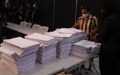 <p><strong>SPILL CASE.</strong> Agents of the National Bureau of Investigation-Environmental Crime Division prepare the documents for the filing of perjury and falsification charges before the Department of Justice in Manila on Tuesday (June 6, 2023) against 35 individuals in connection with the sinking of M/T Princess Empress. The oil taker sank off Naujan town, Oriental Mindoro province on Feb. 28 and left PHP58 million worth of damage in at least four provinces due to the massive oil spill. <em>(PNA photo by Benjamin Pulta)</em></p>