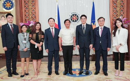 <p><strong>AGRICULTURAL MECHANIZATION.</strong> President Ferdinand R. Marcos Jr. poses for photo opportunity with the Department of Agriculture and the Korea Agricultural Machinery Industry Cooperative (KAMICO) officials after the signing of a memorandum of understanding on cooperative partnership for agricultural machinery at the Malacañan Palace on Tuesday (June 6, 2023). Marcos said the partnership would improve the country's agricultural productivity and food security initiatives.<em> (Photo courtesy of the Office of the President)</em></p>